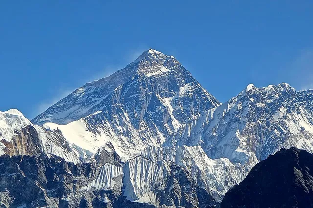 Mount Everest's dark summit pyramid with snow plume, seen from Gokyo Ri, Nepal