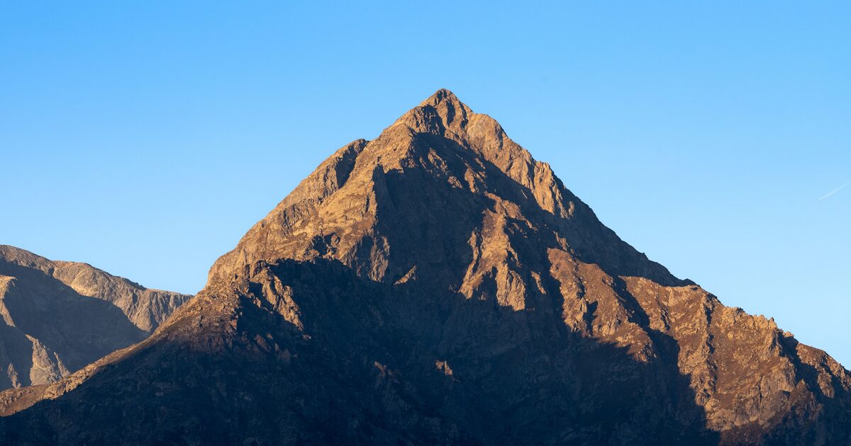 A distinctively sharp pyramidal mountain peak